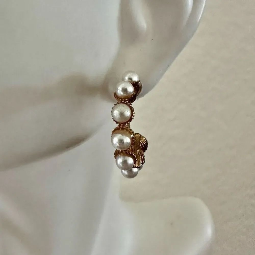 Gold tone faux pearl hoop earrings